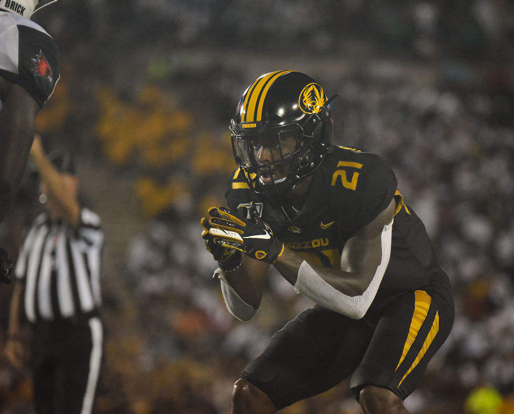 Christian Holmes gets ready to press the receiver